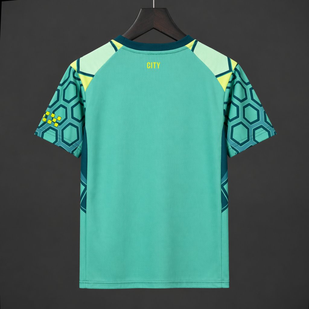 26/27 Manchester City Vibrant Green Goalkeeper Shirt With Dark Blue Geometric Pattern.