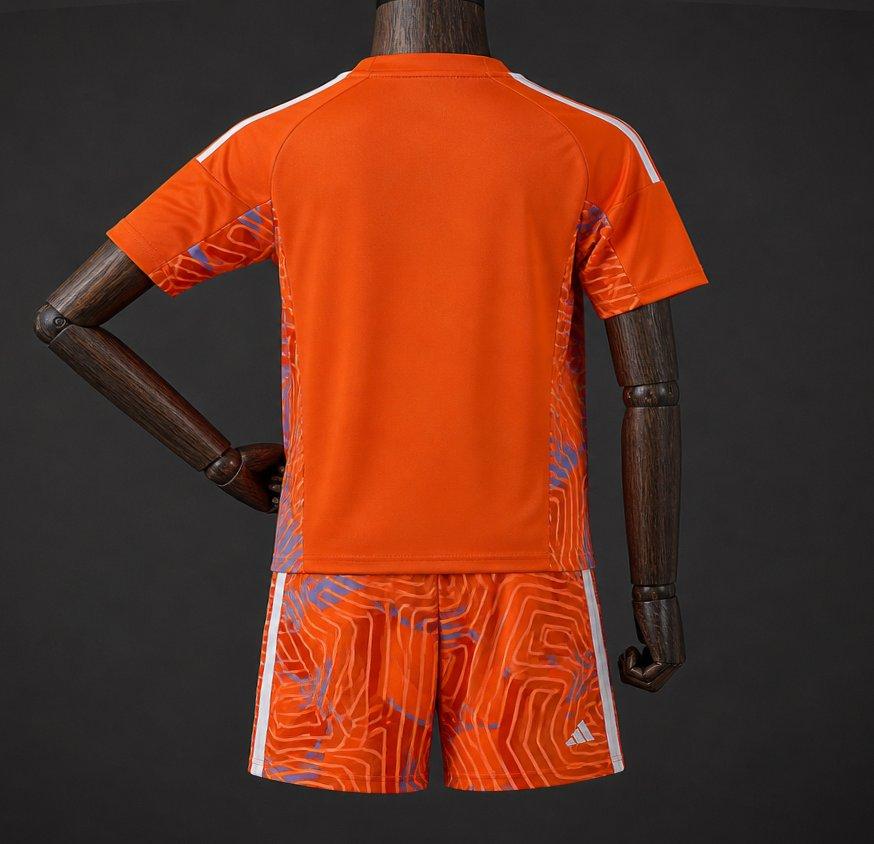 26/27 Kids Juventus Orange with Abstract Maze Pattern Goalkeeper Shirt Set
