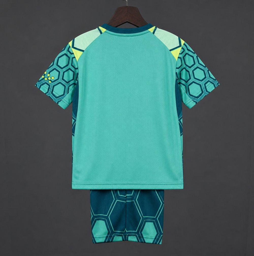 26/27 Kids Manchester City Vibrant Green Goalkeeper Shirt With Dark Blue Geometric Pattern.