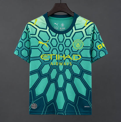 26/27 Manchester City Vibrant Green Goalkeeper Shirt With Dark Blue Geometric Pattern.
